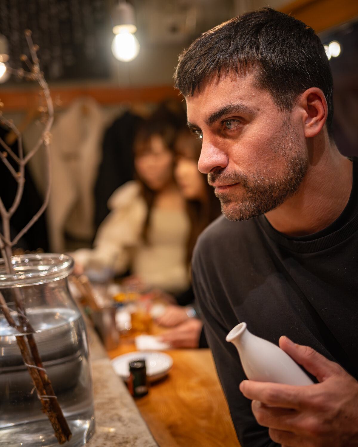 Guest enjoying sake at a local Tokyo izakaya